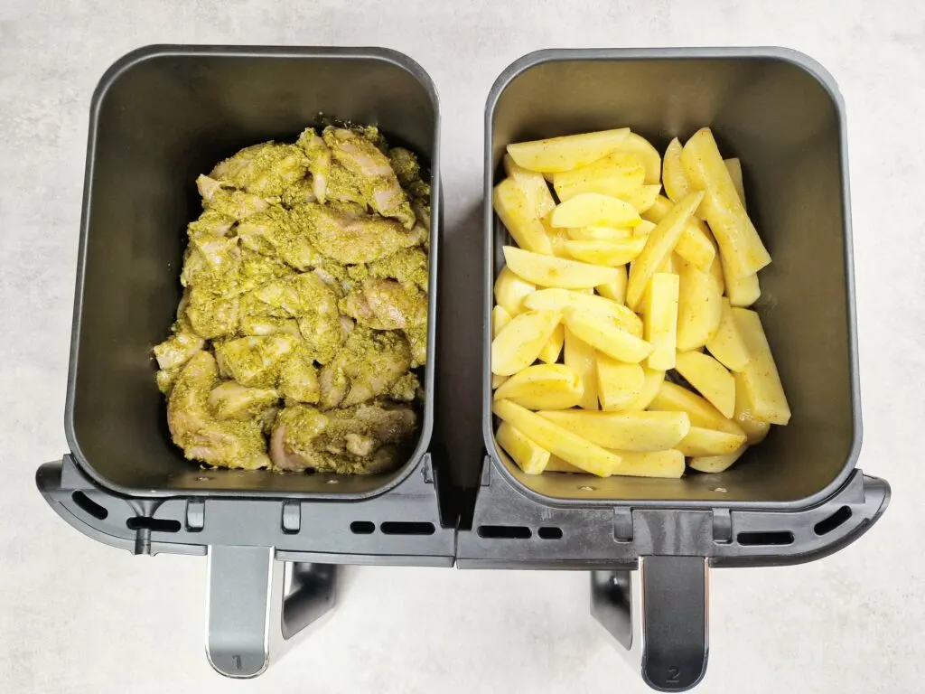 cooking chips and chicken together in an air fryer