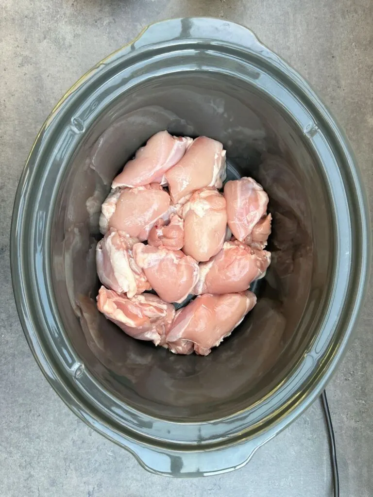raw boneless chicken thighs in slow cooker