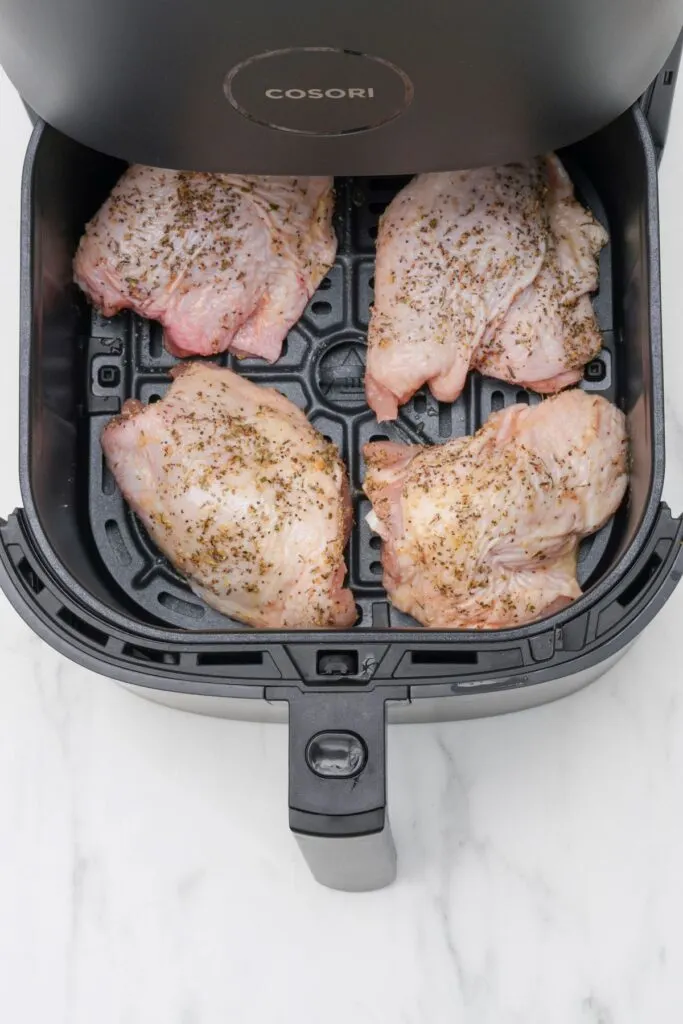 chicken thighs in air fryer basket