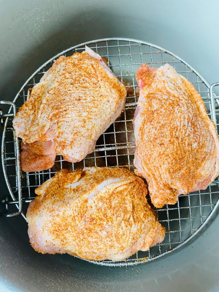 chicken thighs in air fryer on rack