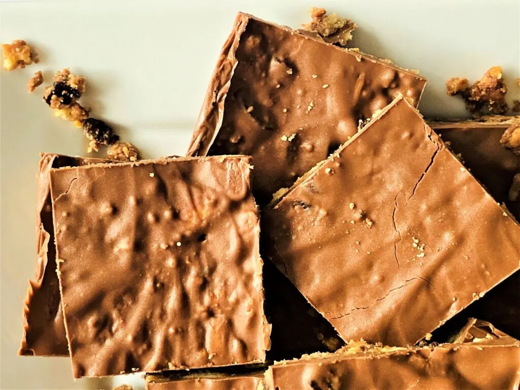 chocolate fridge cake sliced up and on plate