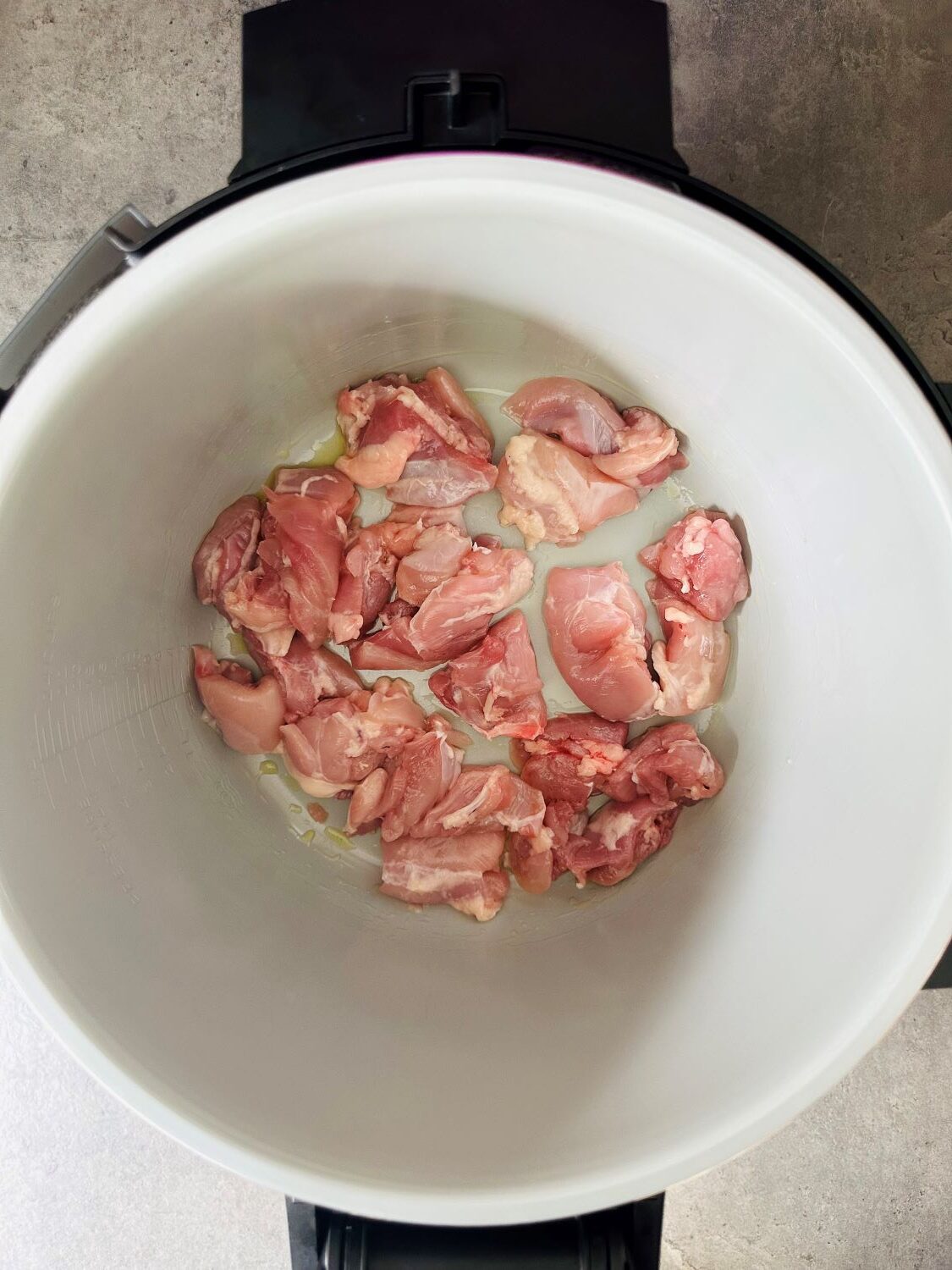 chopped chicken thighs in Ninj Foodi pot