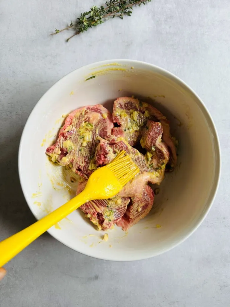 coating lamb chops in marinade