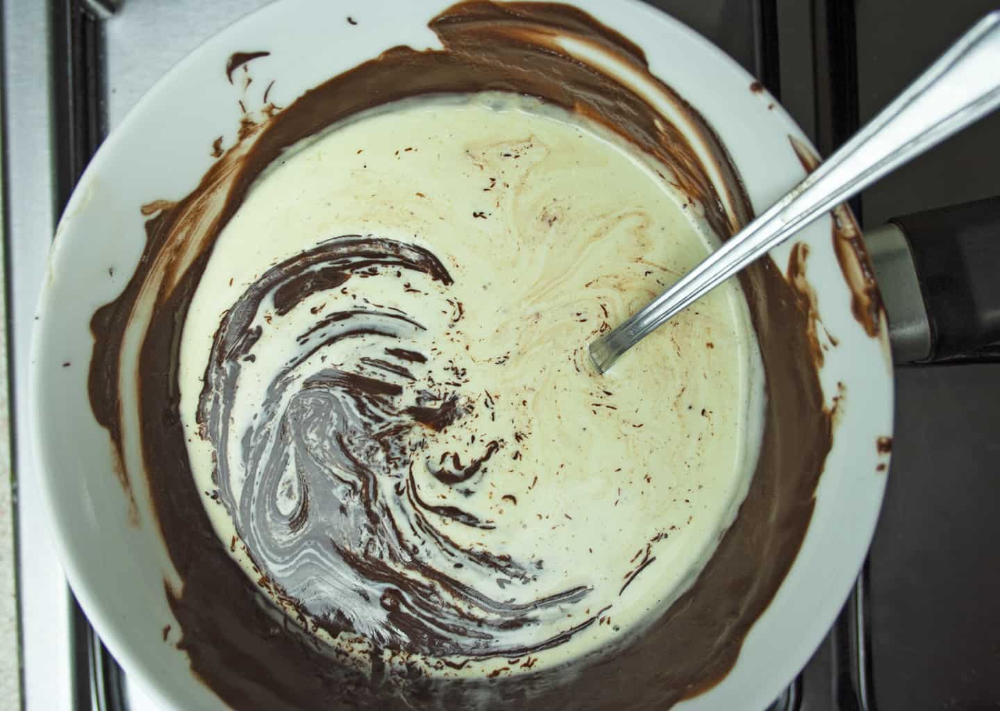 cream, chocolate and butter in bowl