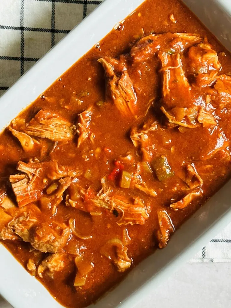 slow cooker curried pulled pork in a serving bowl