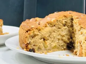 cut apple cake next to air fryer