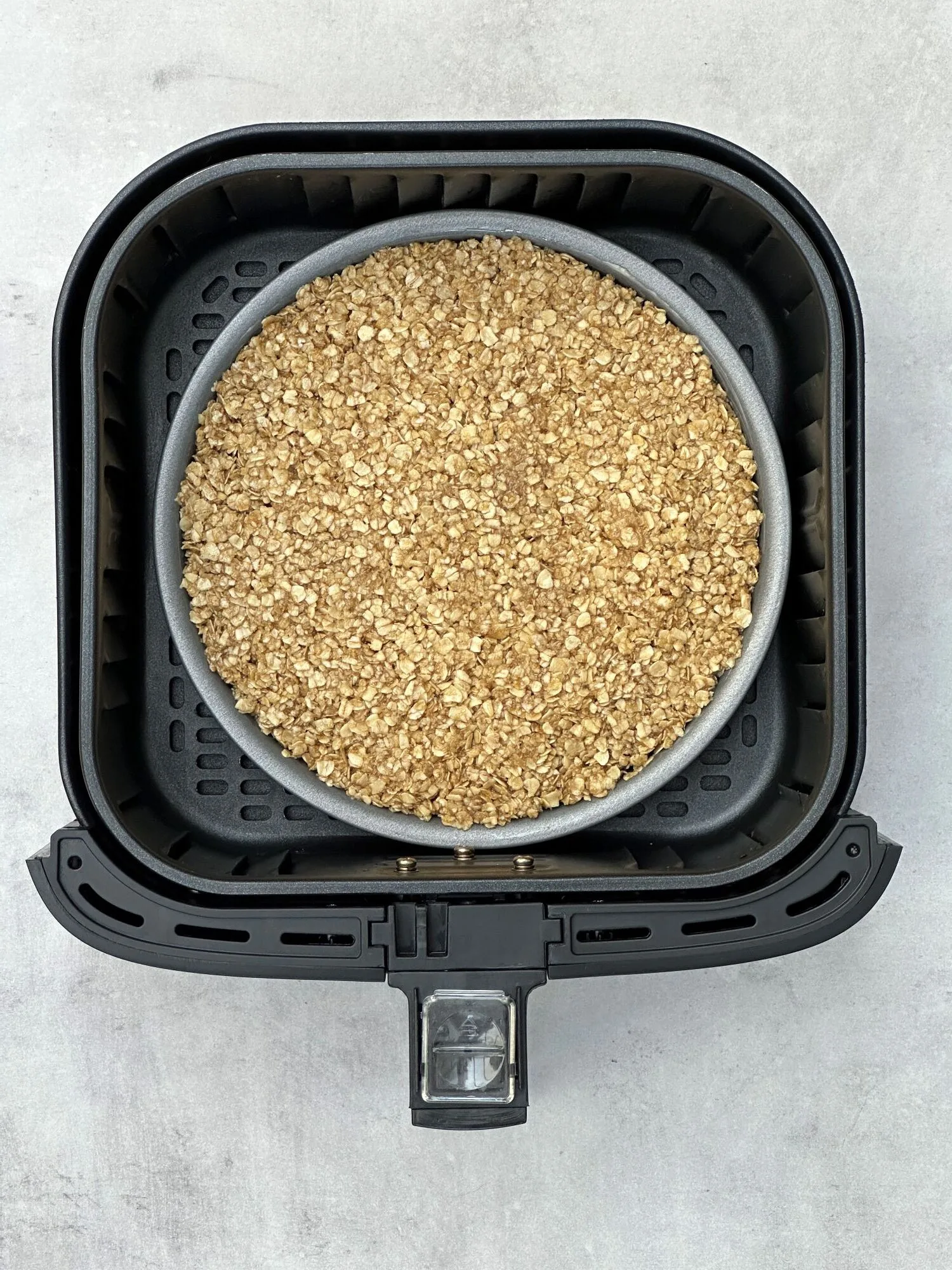 flapjack mixture in 20cm round tin in air fryer