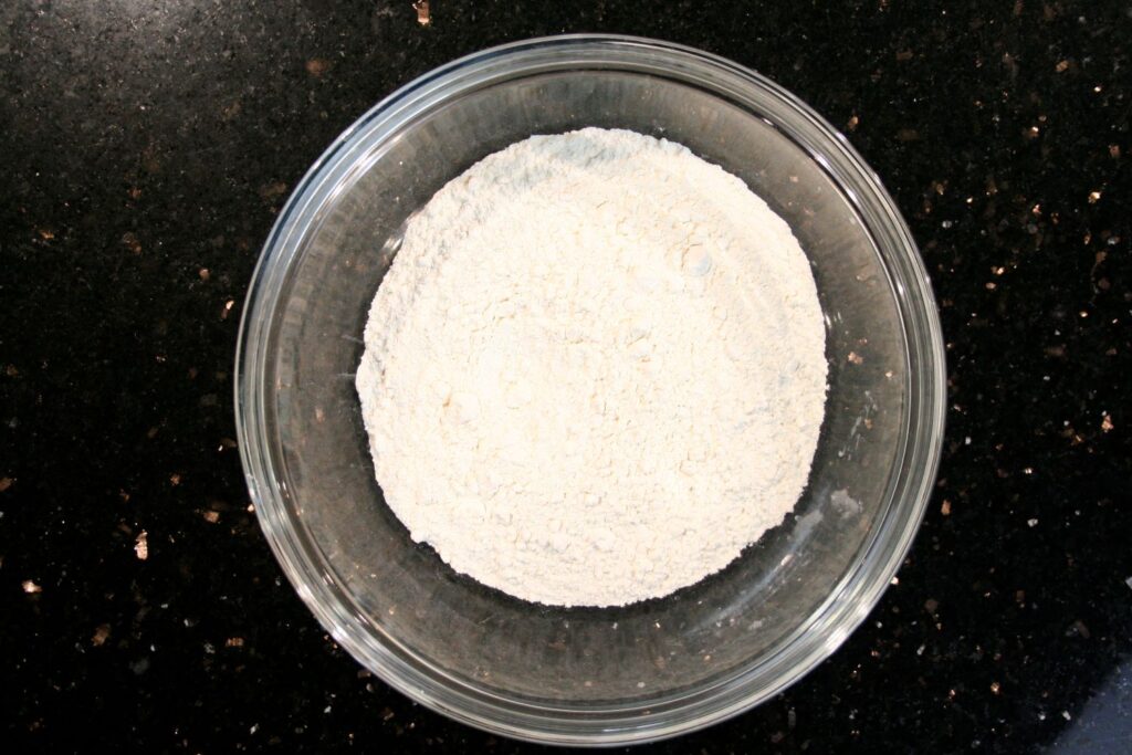 flour in bowl for pizza dough