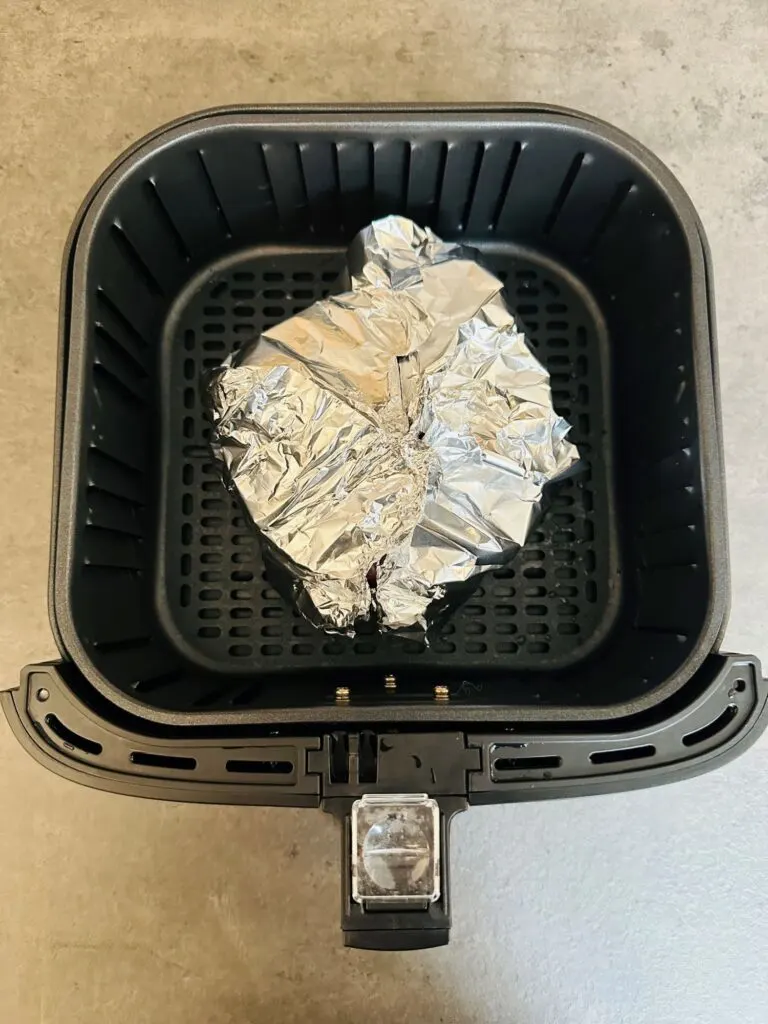gammon wrapped in foil in air fryer basket