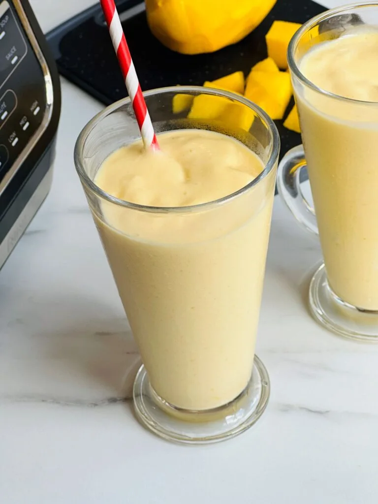 glasses of mango milkshake