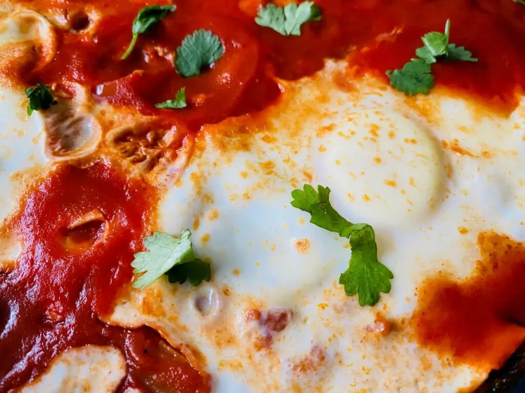 eggs in shakshuka close up