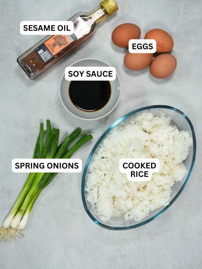ingredients labelled for egg fried rice: sesame oil, eggs, soy sauce, spring onions and cooked rice