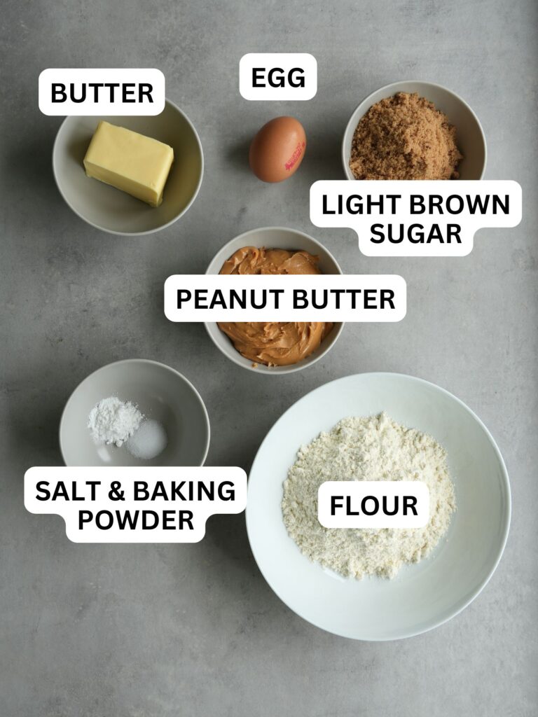 ingredients laid out and labelled for peanut butter cookies