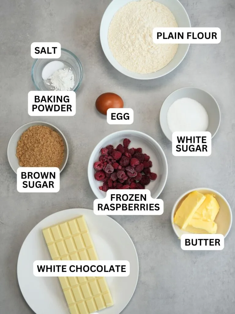 ingredients labelled for raspberry and white chocolate cookies: salt, baking powder, plain flour, egg, white sugar, brown sugar, frozen raspberries, butter, white chocolate