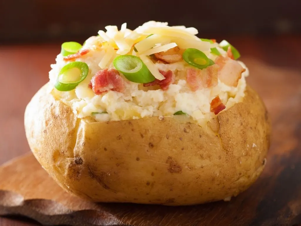 jacket potato with cheese, bacon and onion
