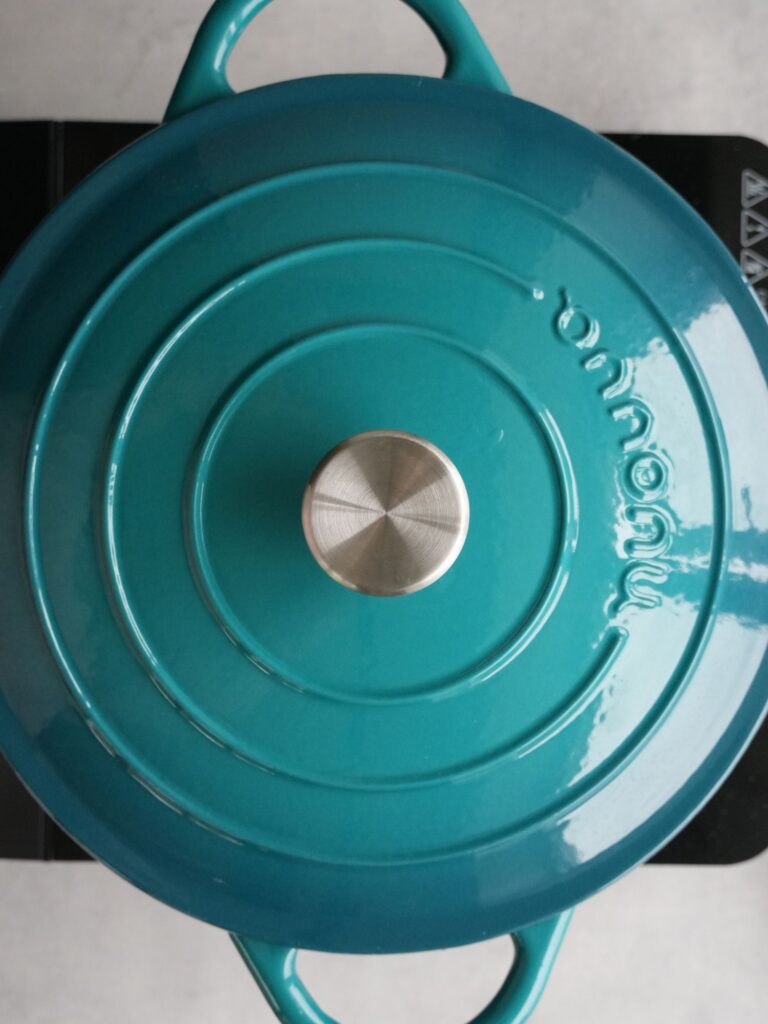 lid on dutch oven while cooking sausage casserole