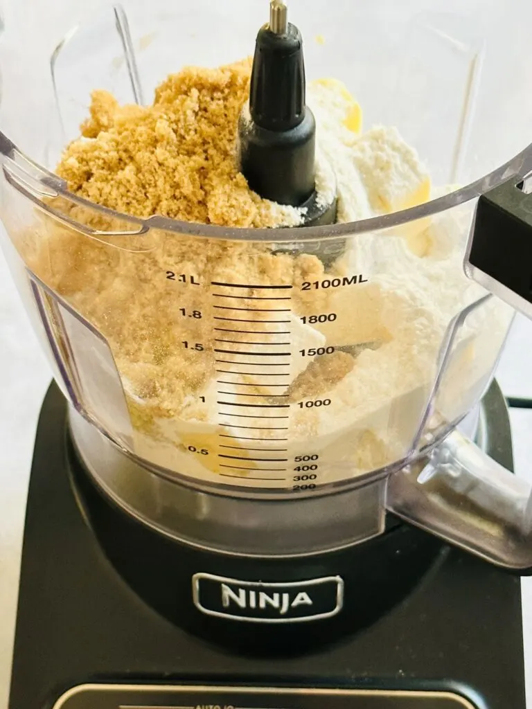 butter, flour, sugar and cinnamon in a Ninja Food Processor