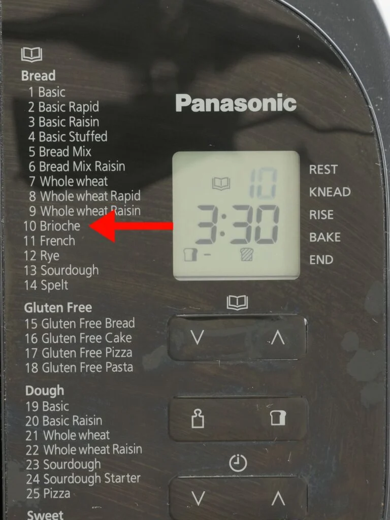 red arrow pointing to menu number 10 brioche on a Panasonic bread maker 