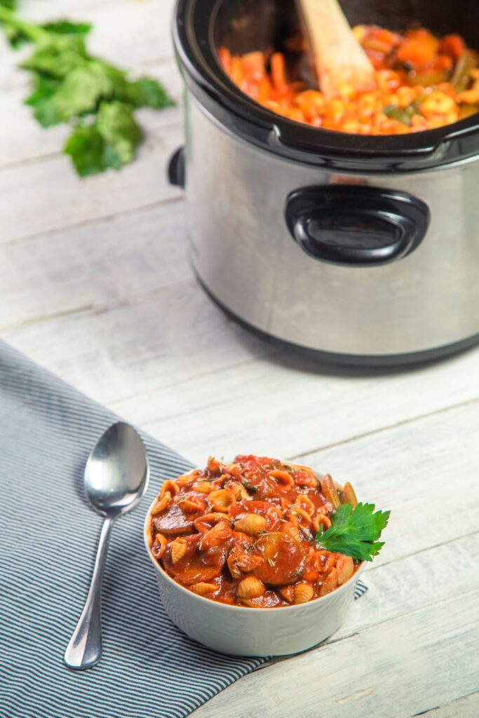 minestrone soup next to slow cooker