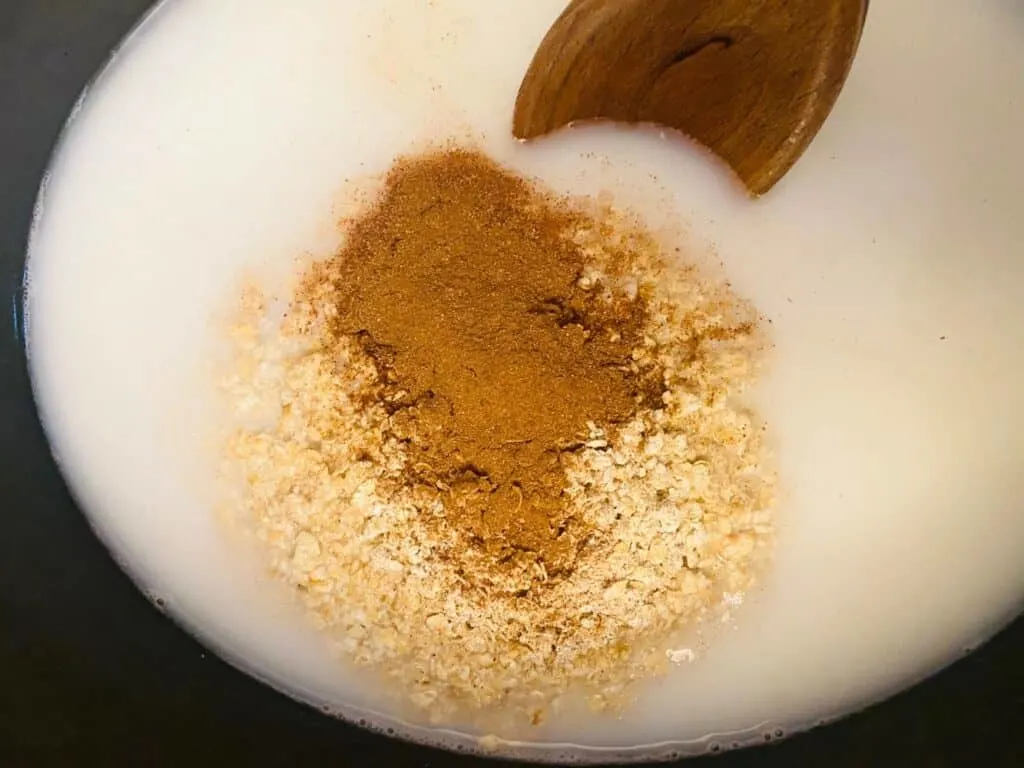 mixing ingredients for slow cooker porridge