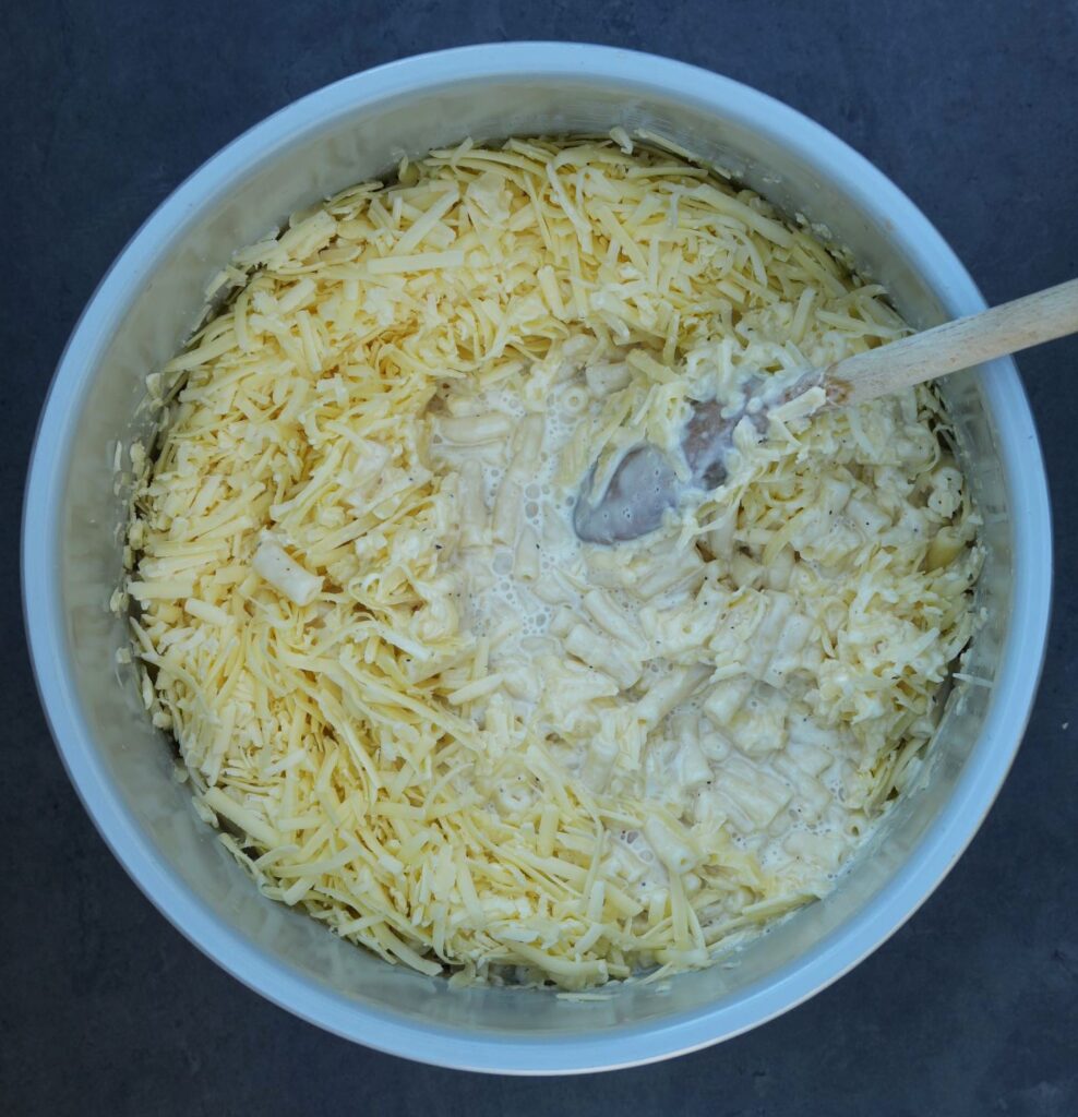 mix the cheese in with the macaroni