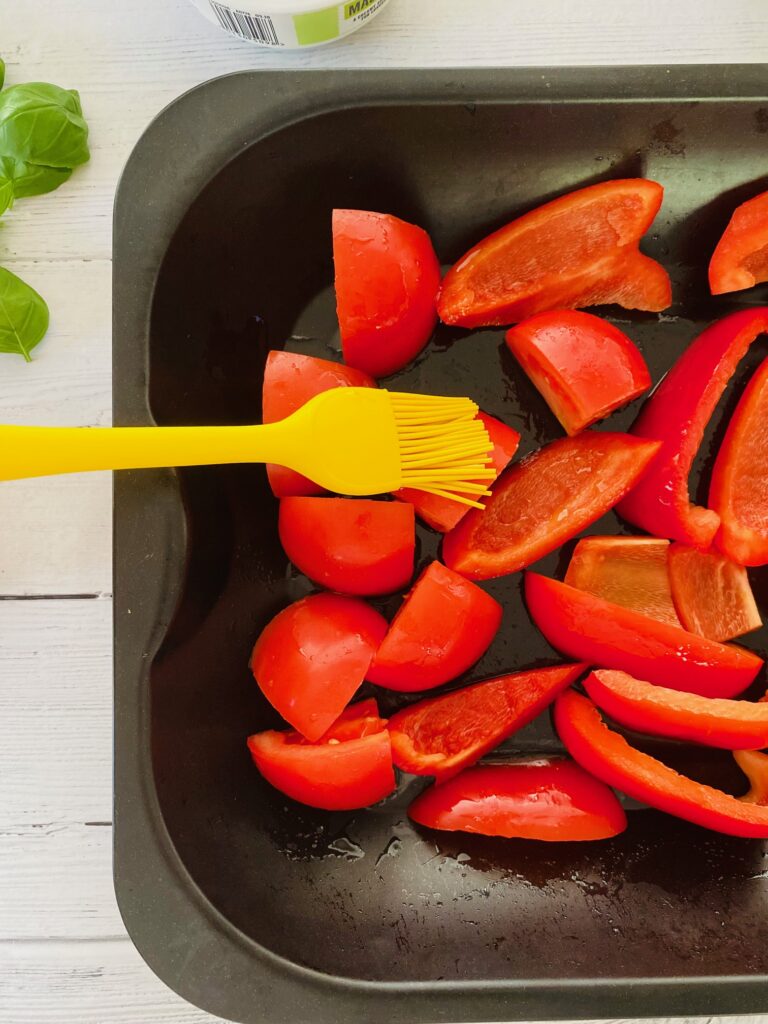 oiling peppers and tomatoes
