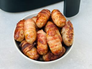 pigs in blankets next to air fryer