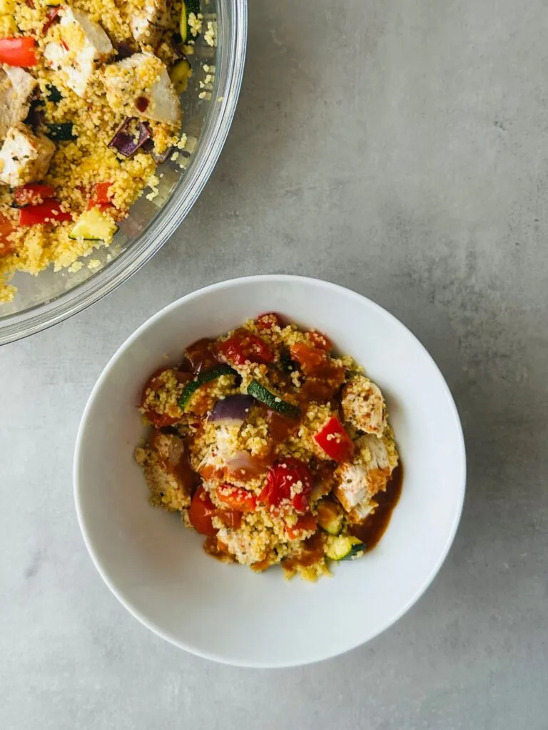 piri piri chicken and couscous in a bowl