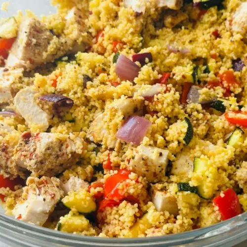 piri piri chicken mixed in with roasted vegetables and couscous