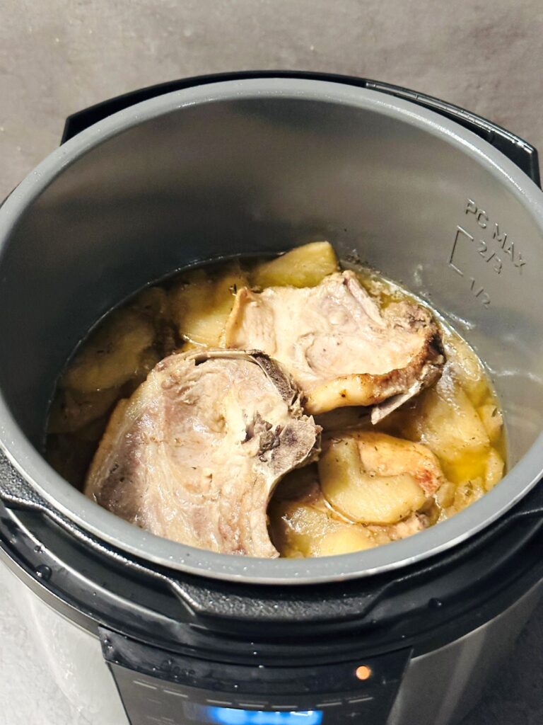 cooked pork chops and apples in Cosori multi cooker