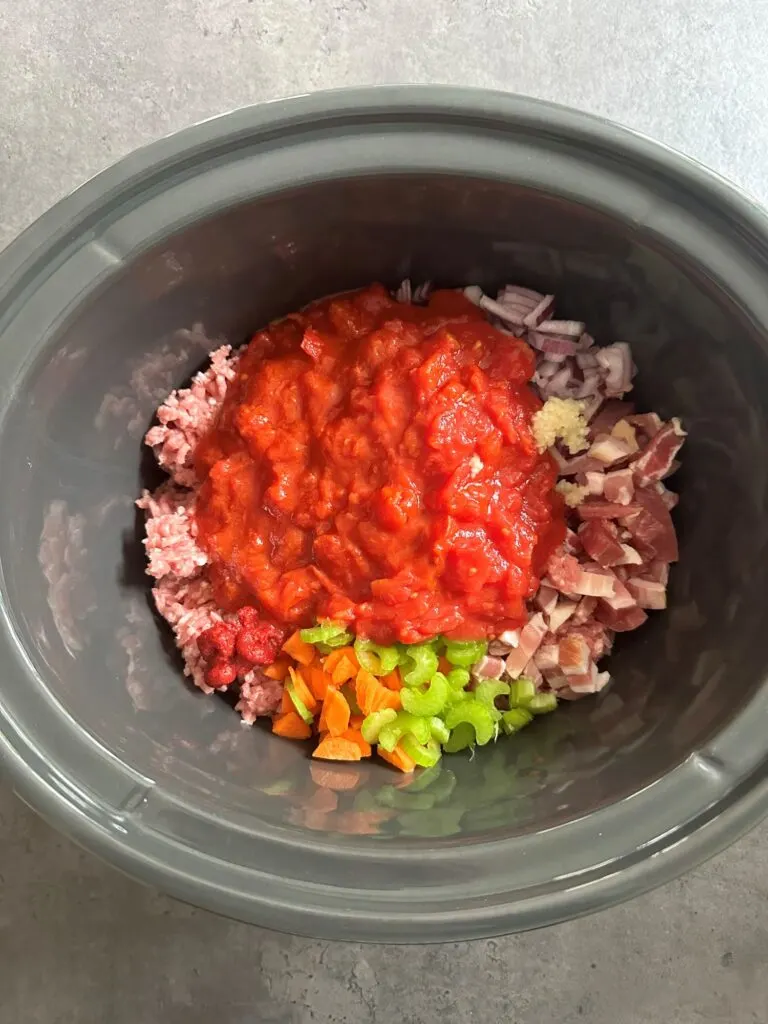 pork ragu ingredients ready to cook in slow cooker