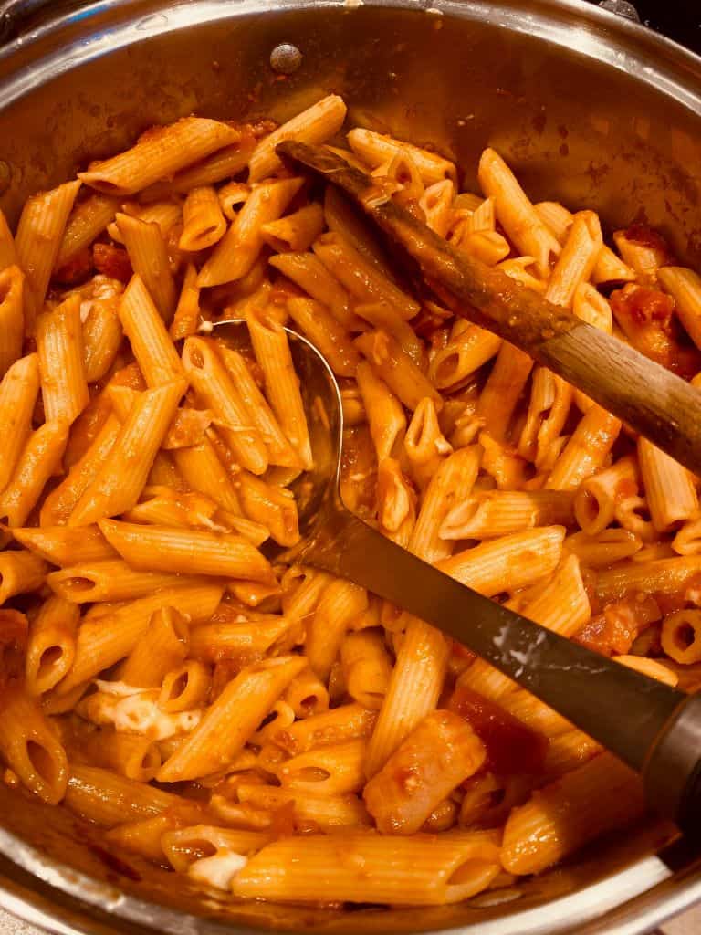 boiled pasta with tomato sauce for pasta bake