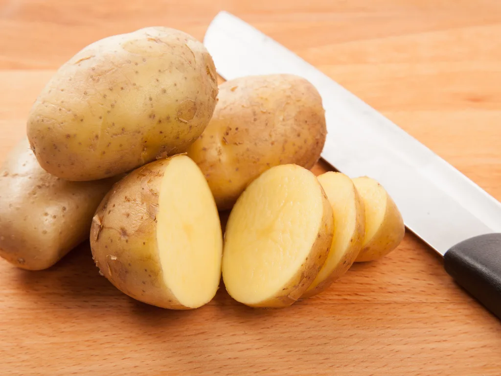 preparing potatoes for oven chips