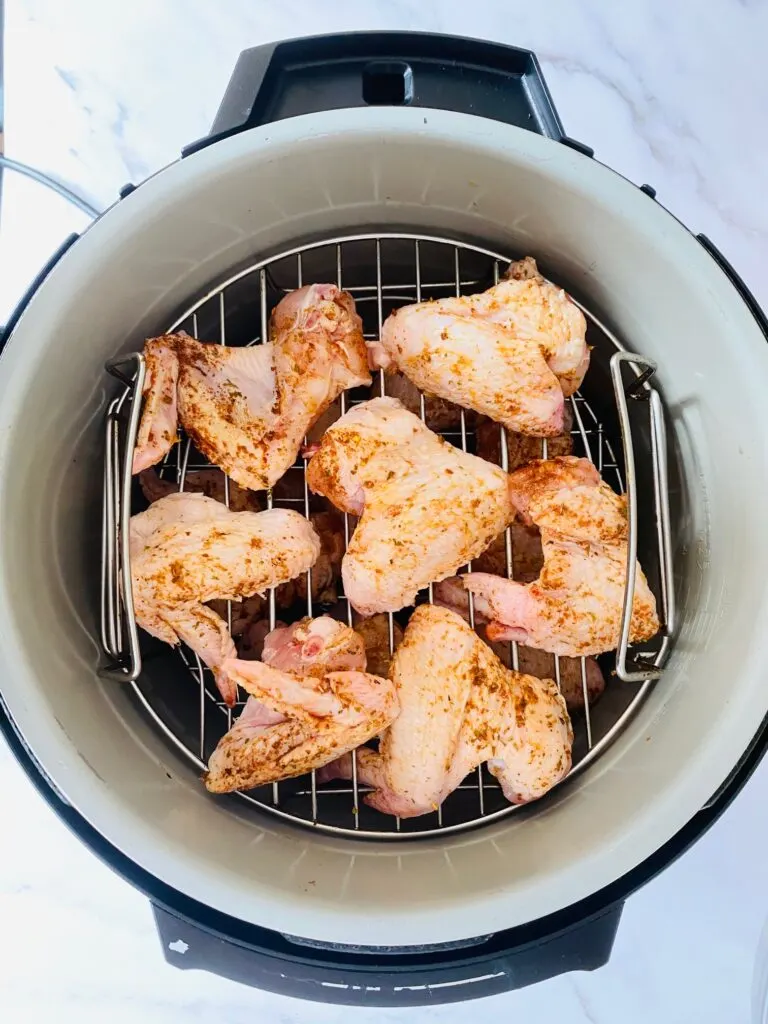 chicken wings in air fryer on rack