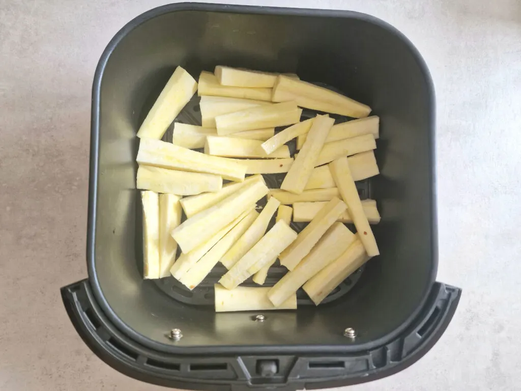 raw parsnips in air fryer basket