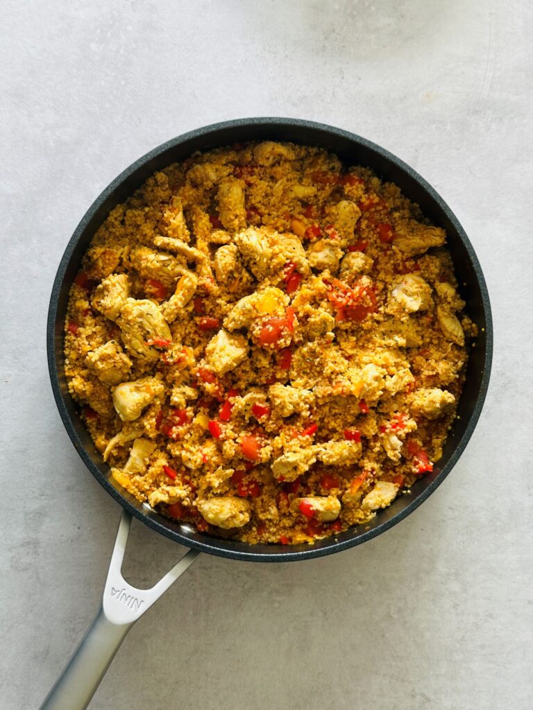 chicken, peppers, chilli, garlic and cous cous in a Ninja saute pan
