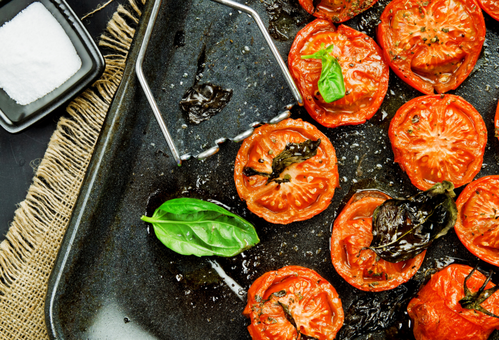 roasted tomatoes on a baking tray