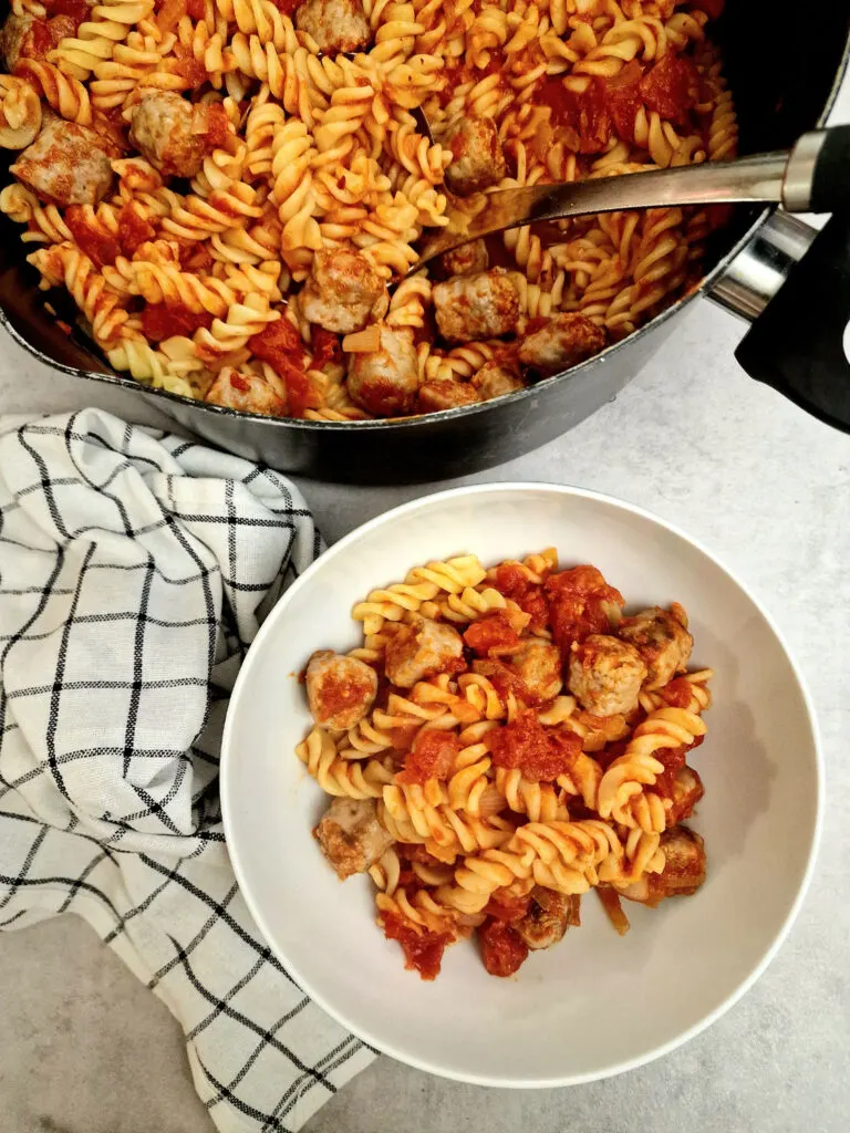 sausage and pasta in a bowl