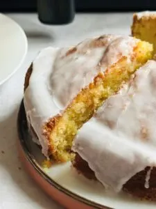 slice of lemon drizzle cake cooked in an air fryer