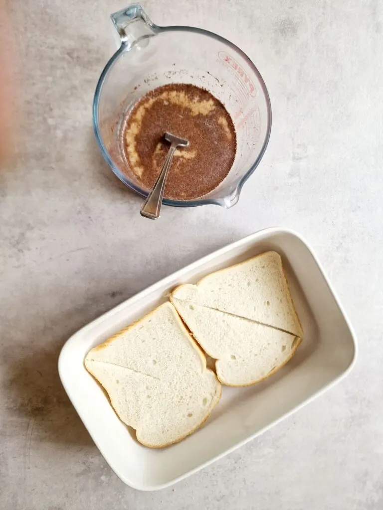 sliced bread next to egg and cinnamon mixture