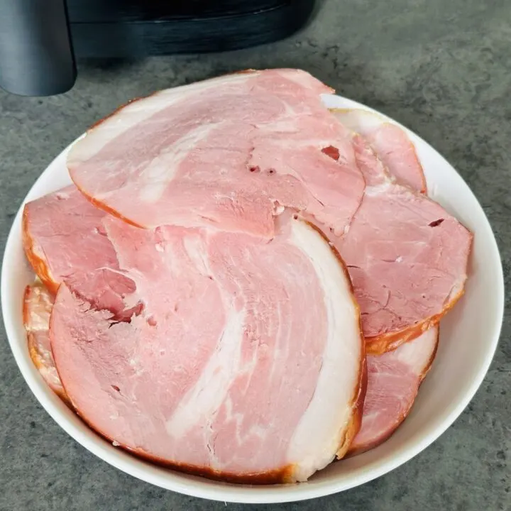 sliced gammon joint next to air fryer