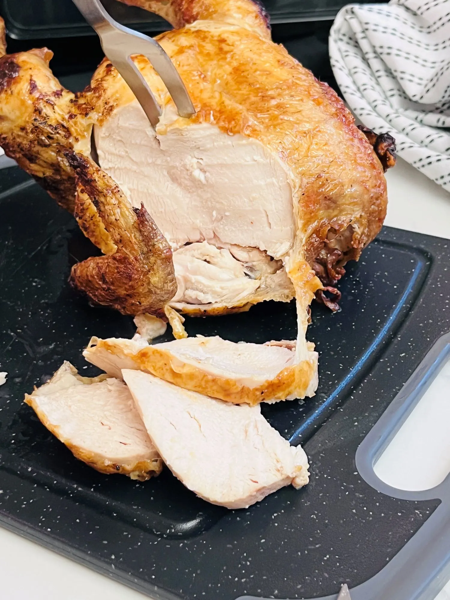 carving a rotisserie chicken