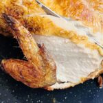 slicing rotisserie whole chicken