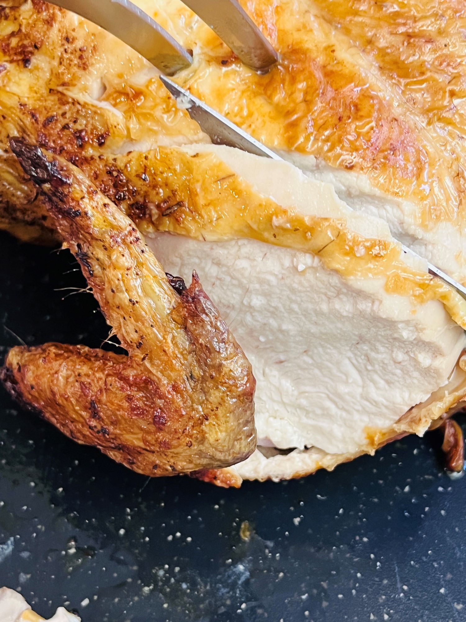 slicing rotisserie whole chicken