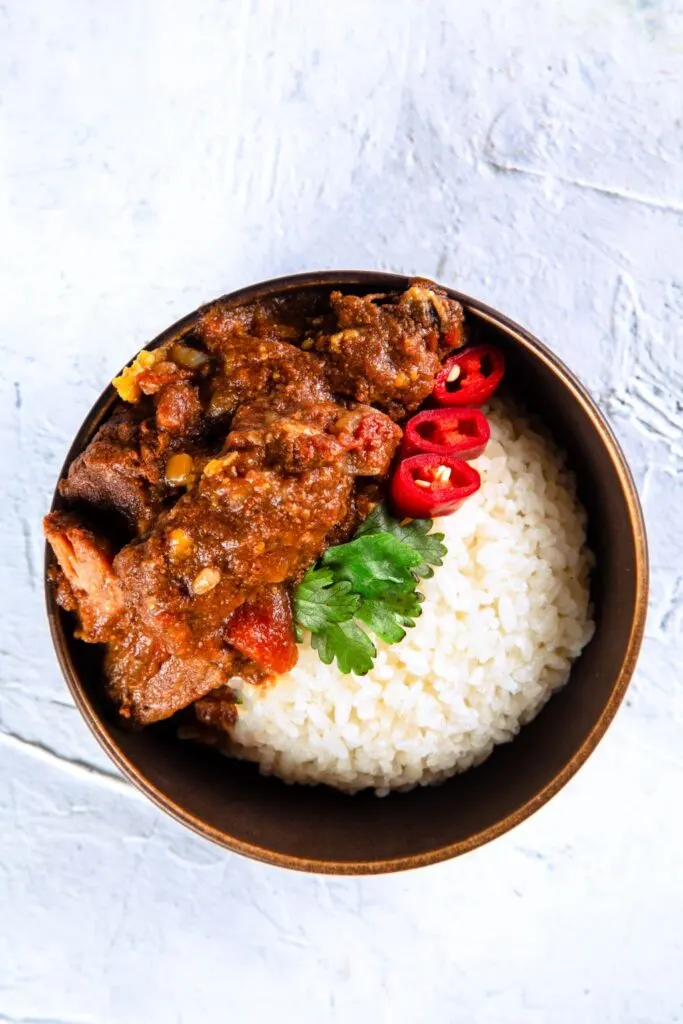 Slow Cooker Beef Curry slow cooker beef curry served in a bowl
