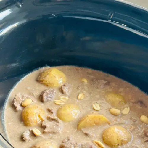 cooked beef massaman curry in a slow cooker