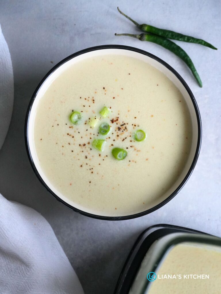 chicken coconut green chilli soup in a soup bowl