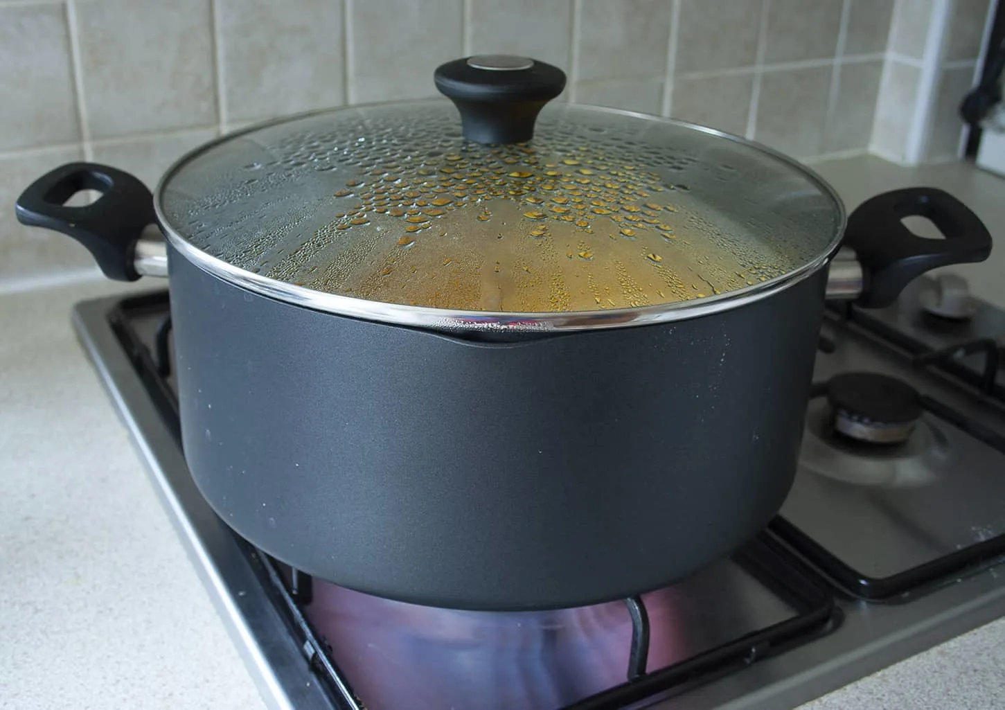 steaming the pumpkin in a saucepan