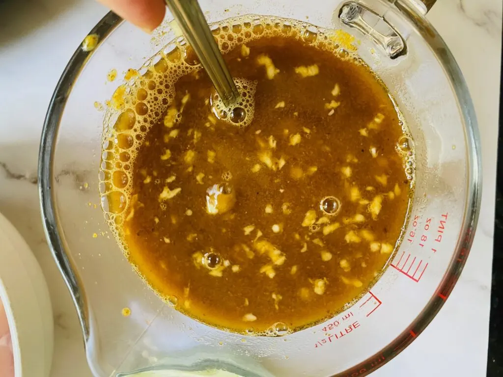 mixing ingredients for slow cooker Chinese chicken