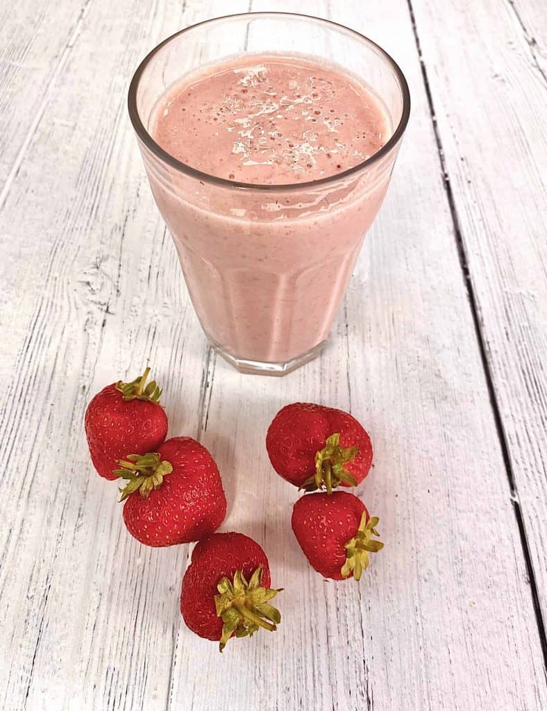 strawberry and banana smoothie with fresh strawberries